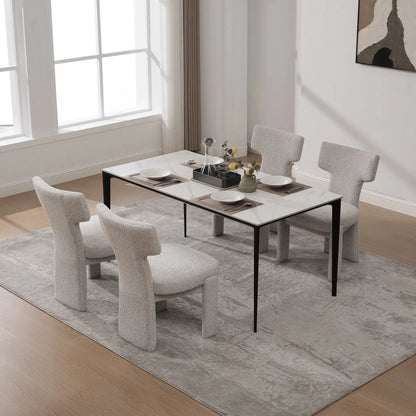 Armless curved-back accent chairs in light gray fabric around dining table; six chairs on Tampa Home & Garden Store