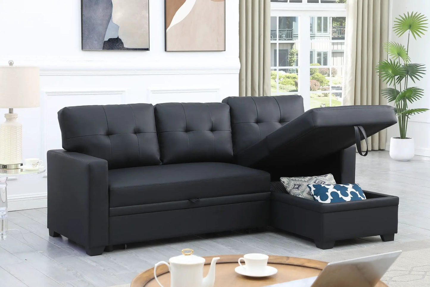 Upholstered pull-out sleeper sectional sofa with chaise in black faux leather by Unique Piece Furniture on Tampa Home & Garden Store