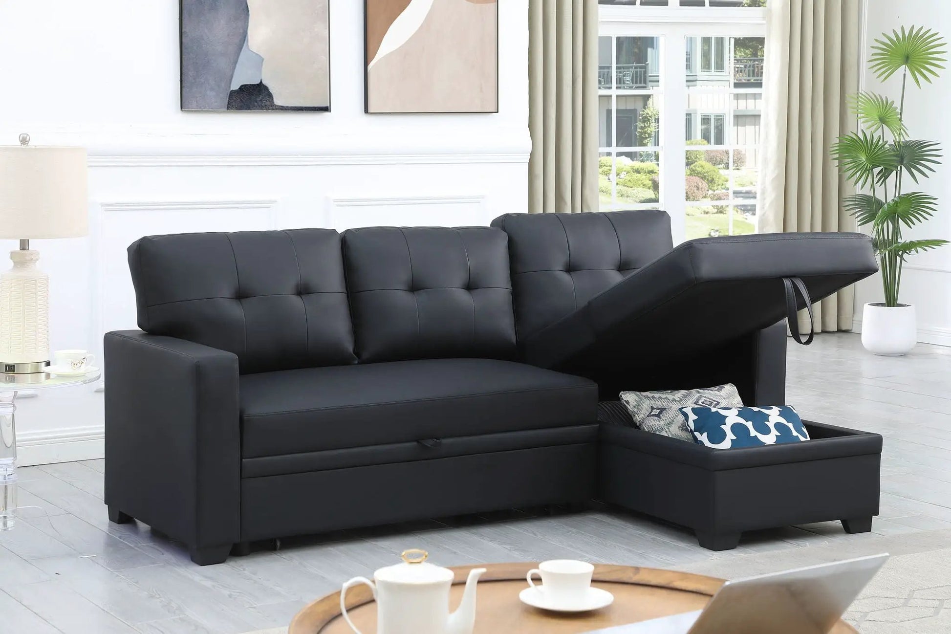 Upholstered pull-out sleeper sectional sofa with chaise in black faux leather by Unique Piece Furniture on Tampa Home & Garden Store