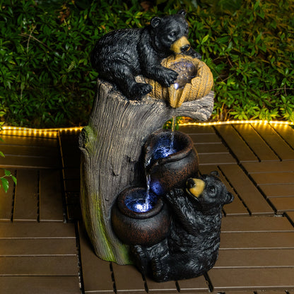 Bear Outdoor Water Fountain with LED Lights, black bear statue with blue glowing bowls on Tampa Home & Garden Store