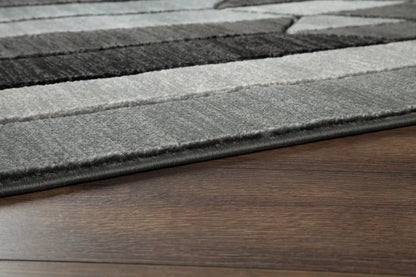 Chayse rug by Unique Piece Furniture, gray striped plush pile area rug on wood floor on Tampa Home & Garden Store