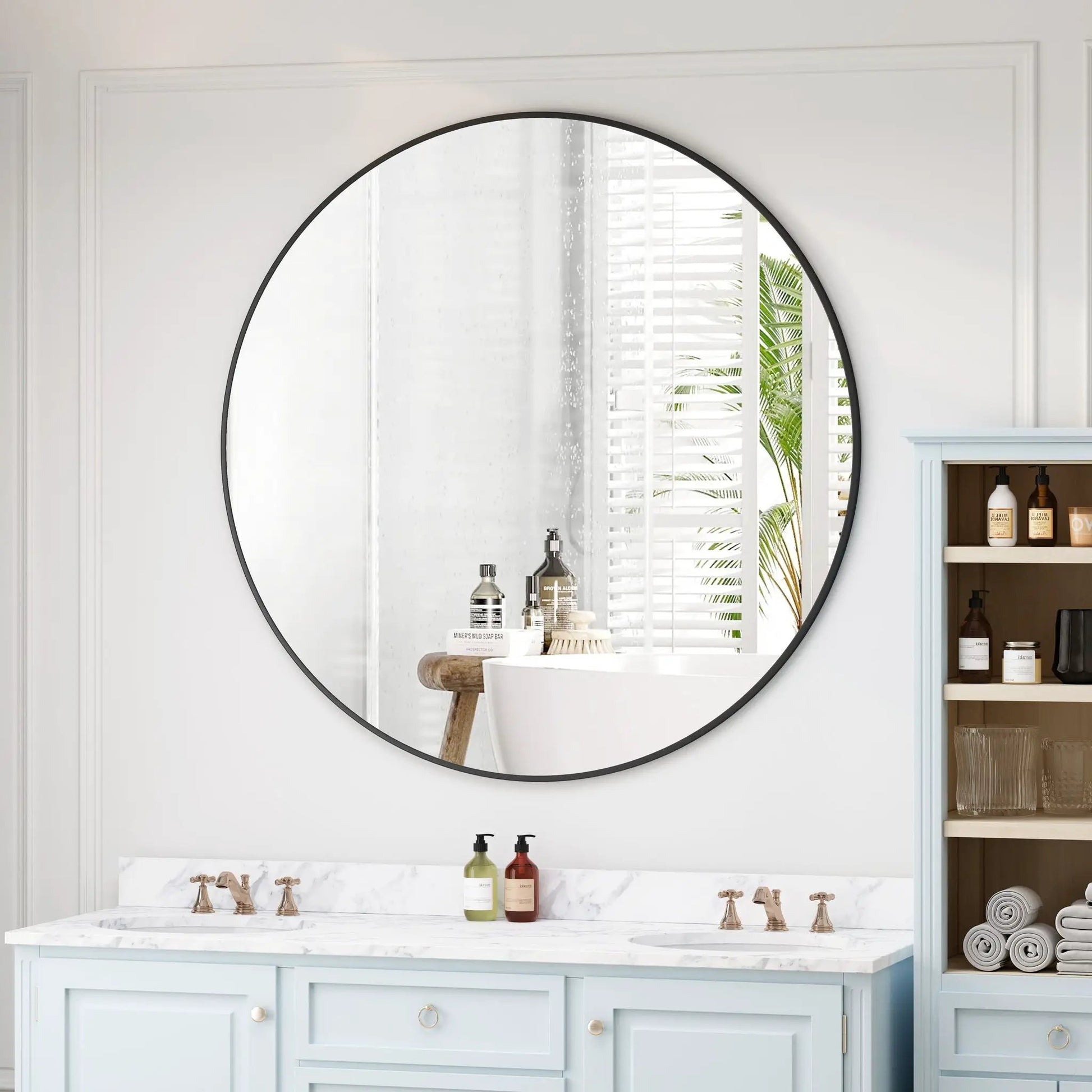 Round black metal-framed wall mirror for bathroom vanity on Tampa Home & Garden Store