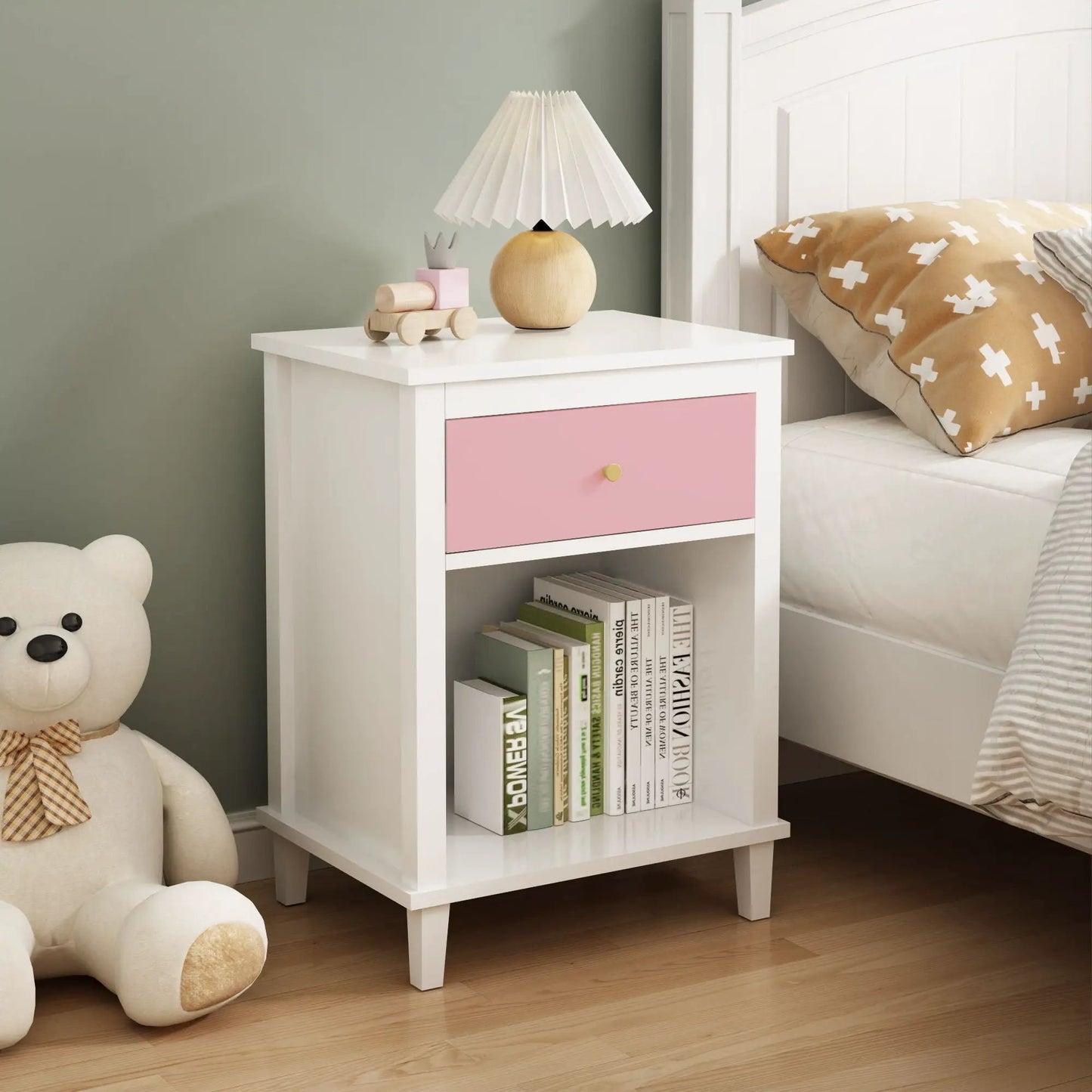 Nightstand with 1 Drawer 1 Shelf white frame pink front, wooden lamp on top beside bed on Tampa Home & Garden Store