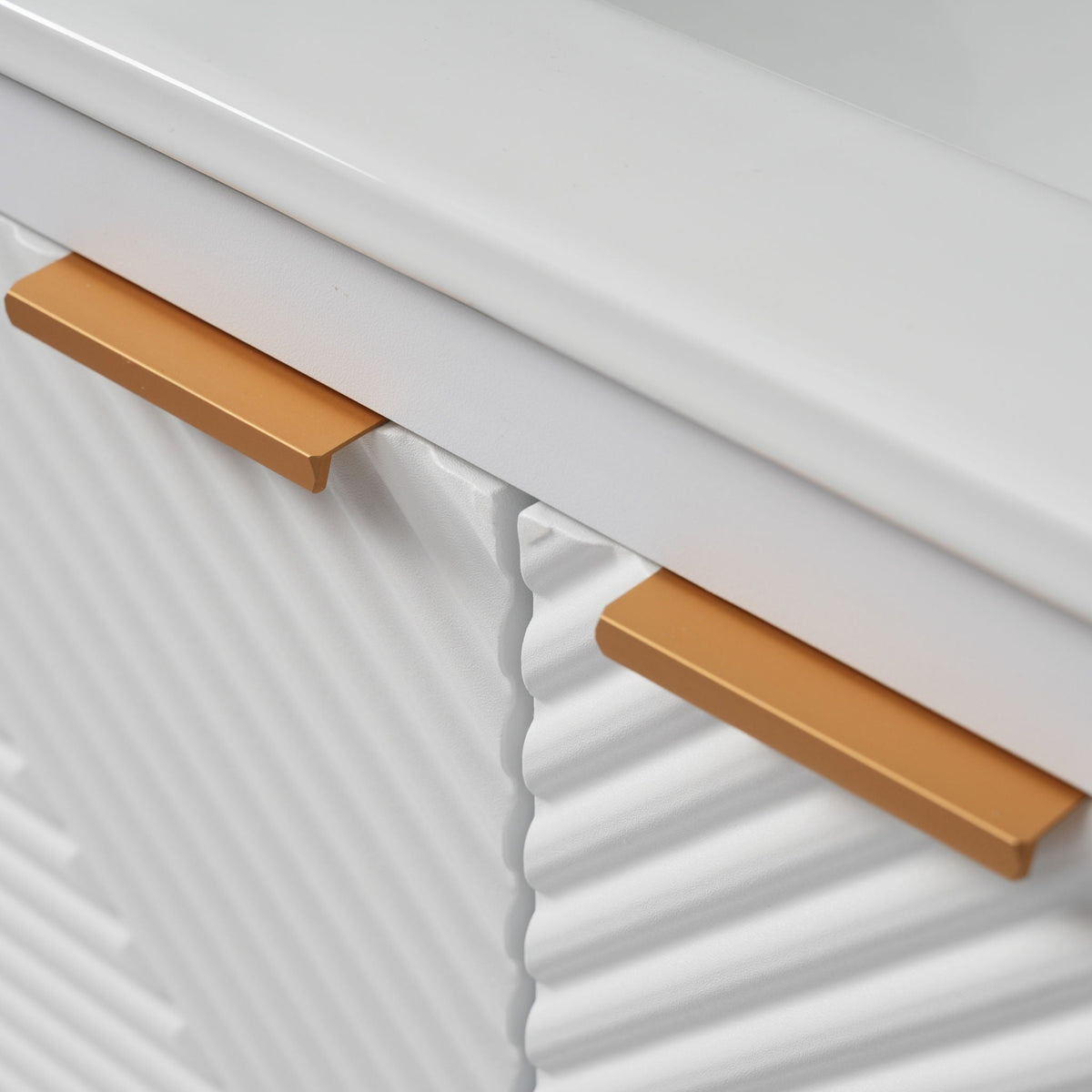 Modern white bathroom vanity cabinet with gold bar pull handles for compact storage on Tampa Home & Garden Store