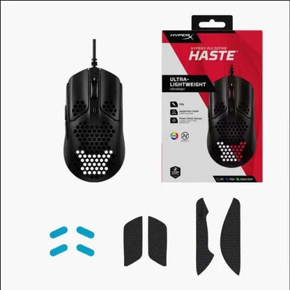 Wired USB gaming optical mouse with black honeycomb shell; blue grip inserts and side panels on Tampa Home & Garden Store
