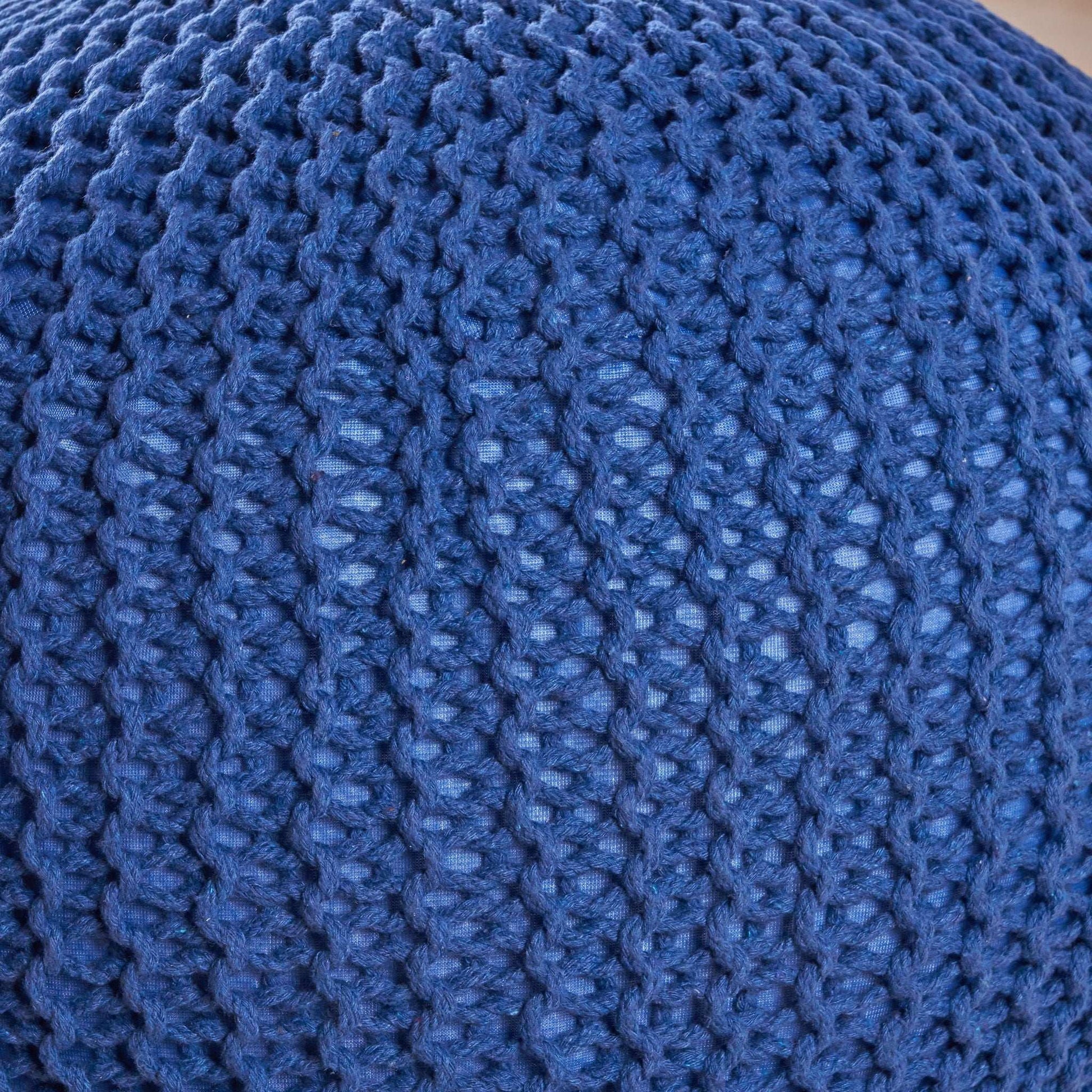 Blue knitted cotton round pouf close-up texture, accent ottoman on Tampa Home & Garden Store
