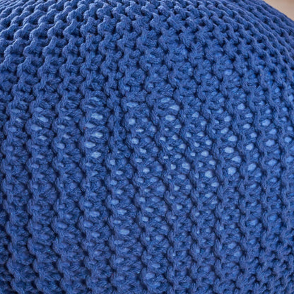Blue knitted cotton round pouf close-up texture, accent ottoman on Tampa Home & Garden Store