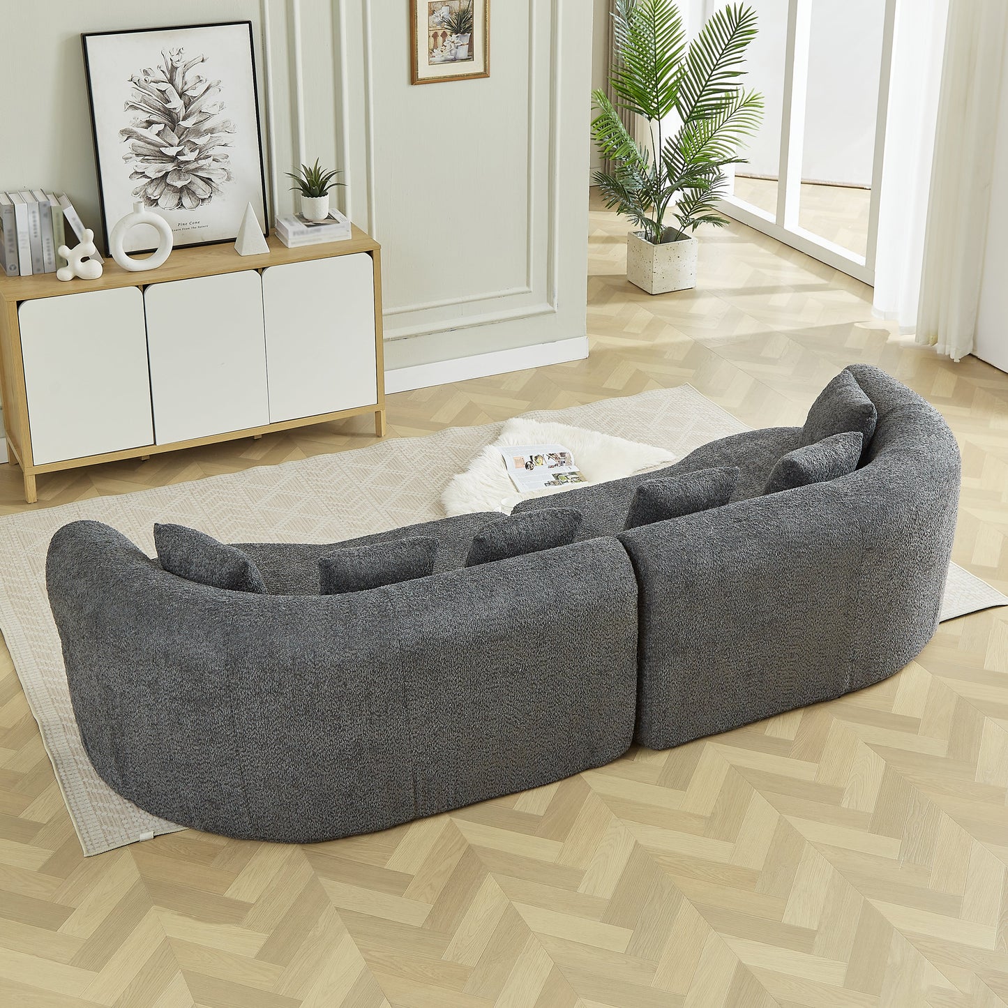 Curved sectional sofa in dark gray fabric, oversized modern design on Tampa Home & Garden Store