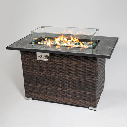 44-inch propane fire pit table with tile top and wicker base, glass wind guard, blue fire glass on Tampa Home & Garden Store