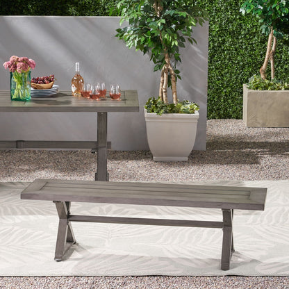 Modern aluminum outdoor dining bench with X base in dark gray on Tampa Home & Garden Store