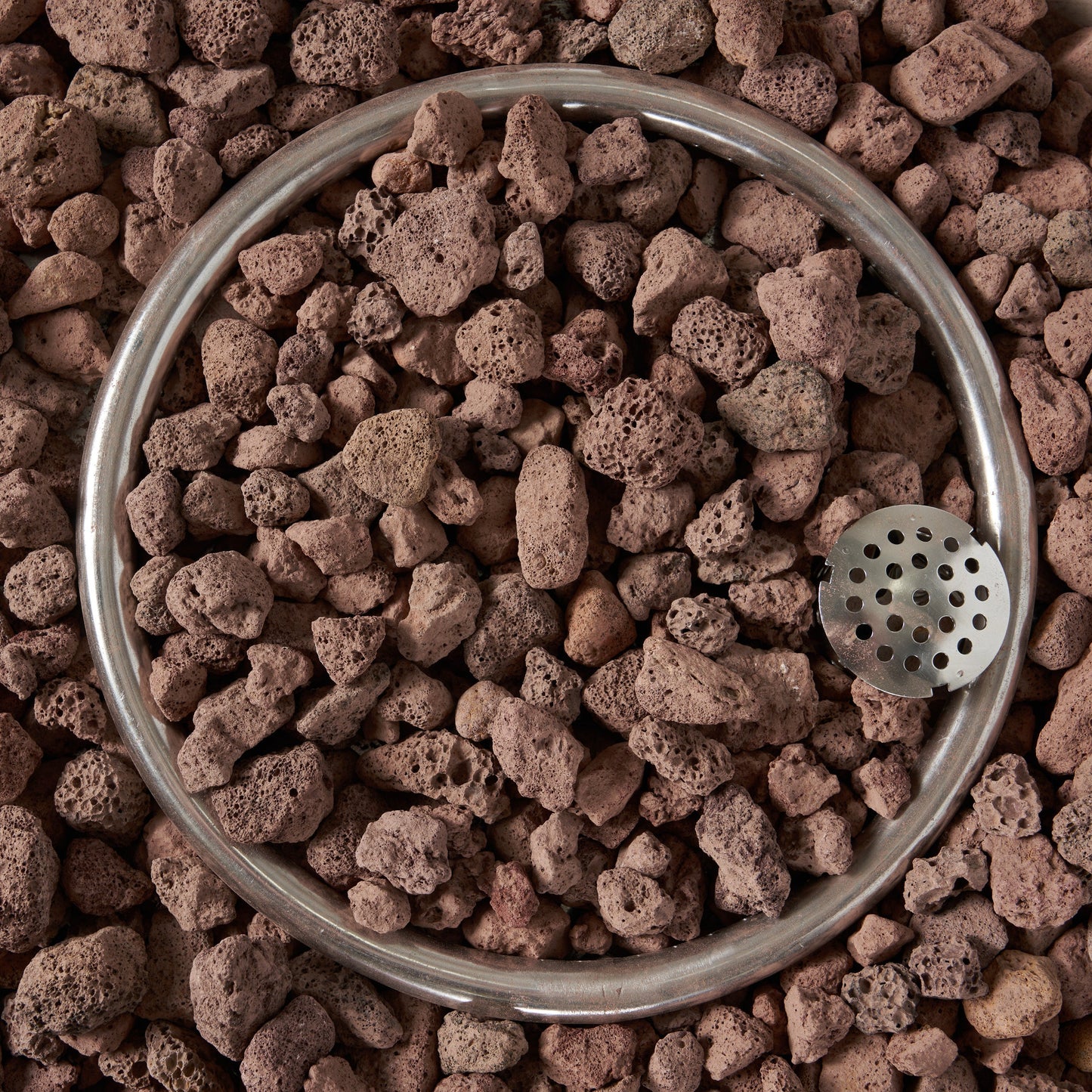 27' bowl shaped MGO 40,000 BTU propane fire pit with light grey metal ring and lava rock fill on Tampa Home & Garden Store
