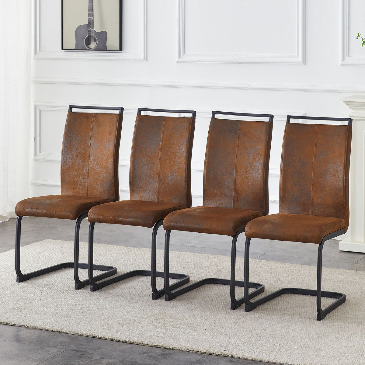Dining chairs with ergonomic backrest; brown leather seats, black metal legs HouseOfZazla on Tampa Home & Garden Store