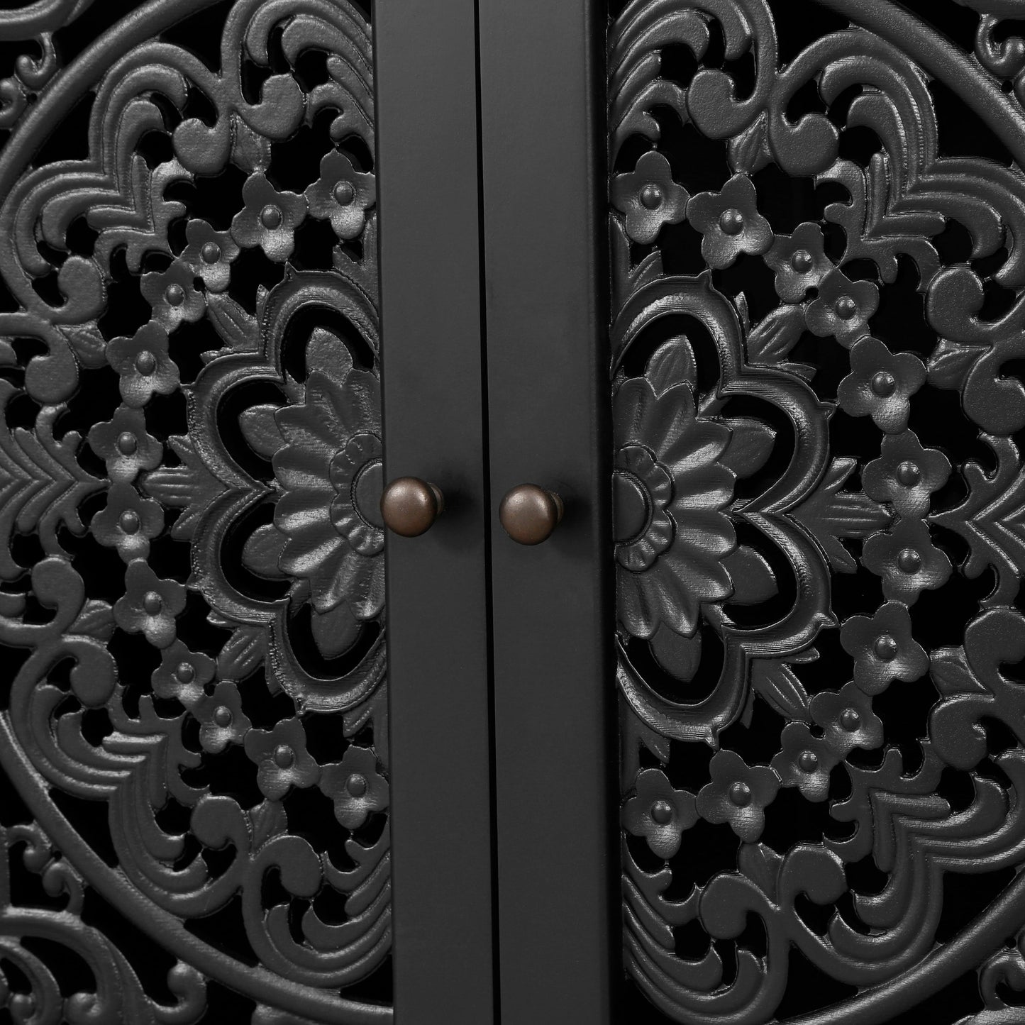 Antique buffet cabinet with floral carvings and two-panel doors in black finish on Tampa Home & Garden Store