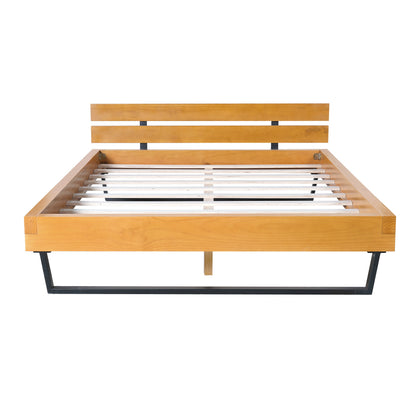 a Queen Pine Bed Frame and Black Iron Accents