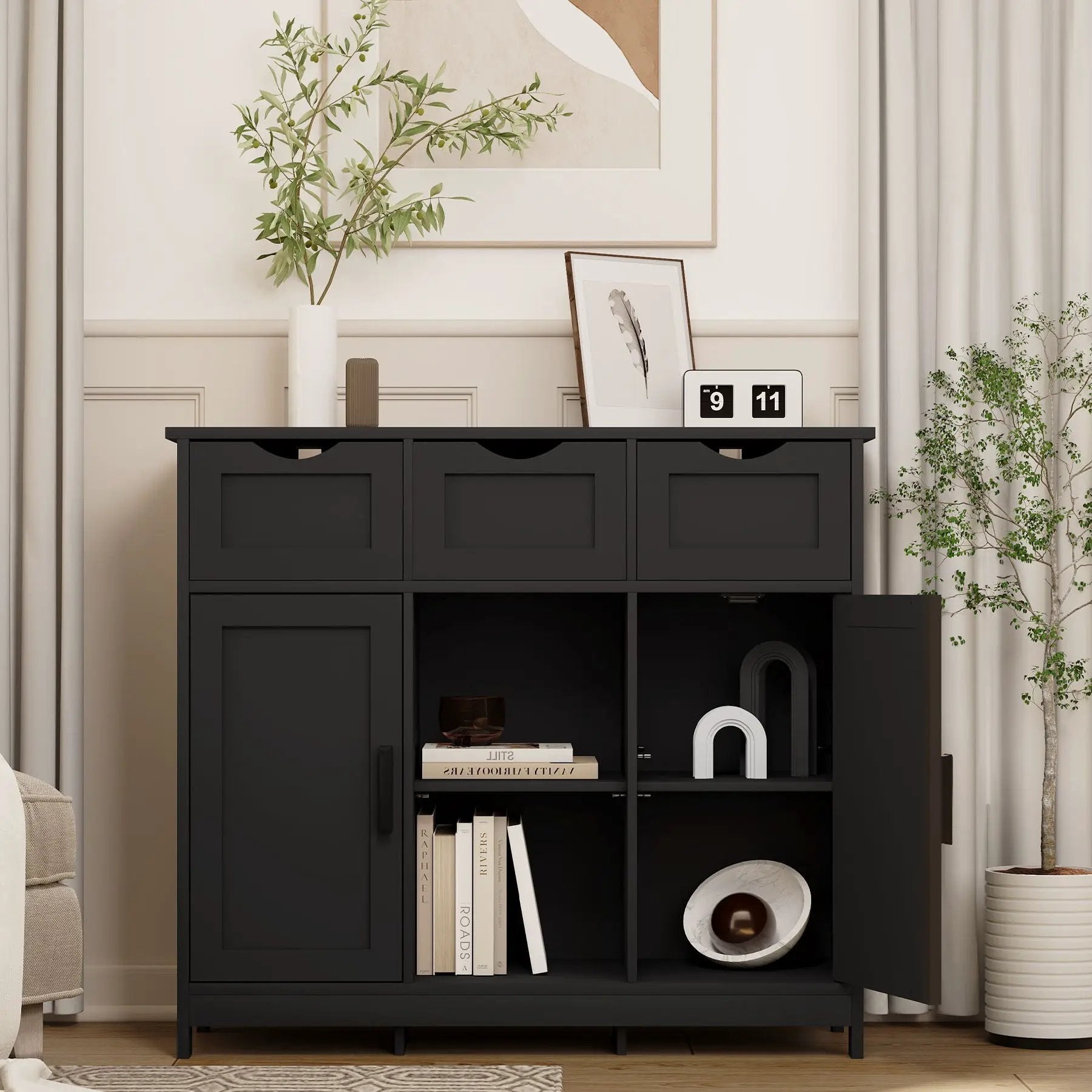 Sideboard storage cabinet with drawers and shelves in a dark matte black finish top vase and framed art on Tampa Home & Garden Store