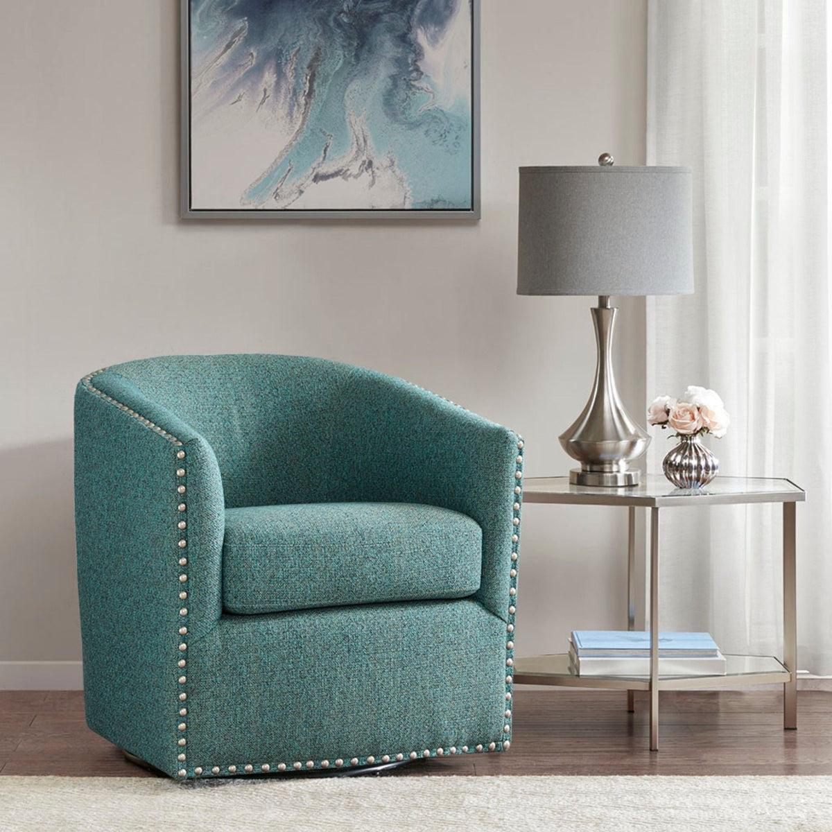 Luxurious swivel chair with nailhead trim in turquoise upholstery, 360° swivel from HouseOfZazla on Tampa Home & Garden Store