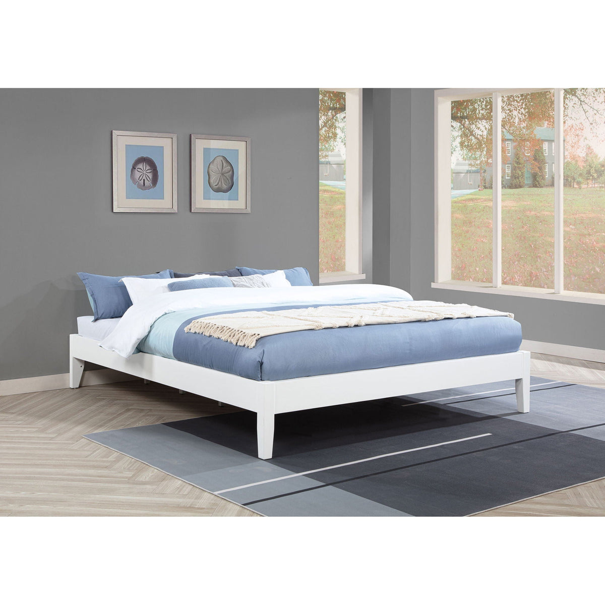Hounslow Platform Bed white frame with blue bedding in a gray-walled bedroom on Tampa Home & Garden Store