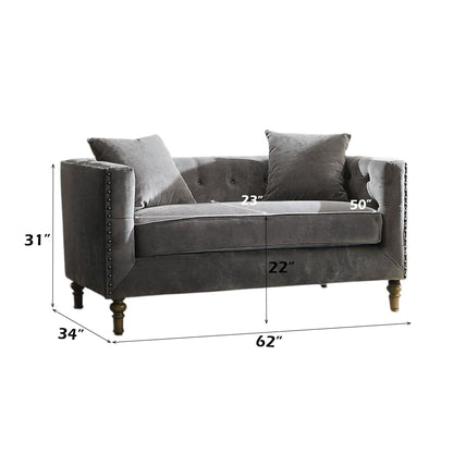 Sidonia gray loveseat with button tufting, two pillows and nailhead trim on Tampa Home & Garden Store