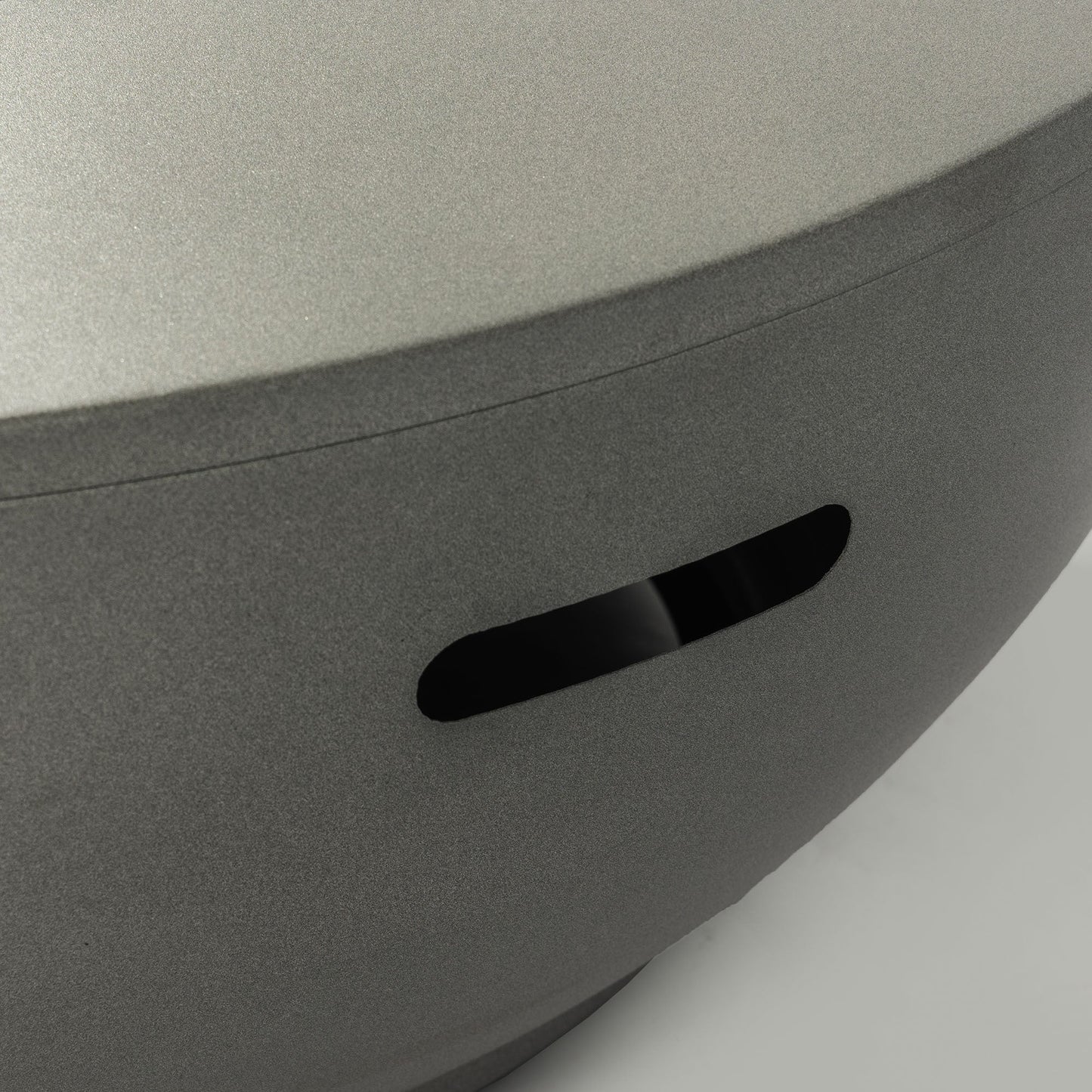36in Propane Gas Fire Pit Table gray steel close-up showing textured surface and curved edge on Tampa Home & Garden Store