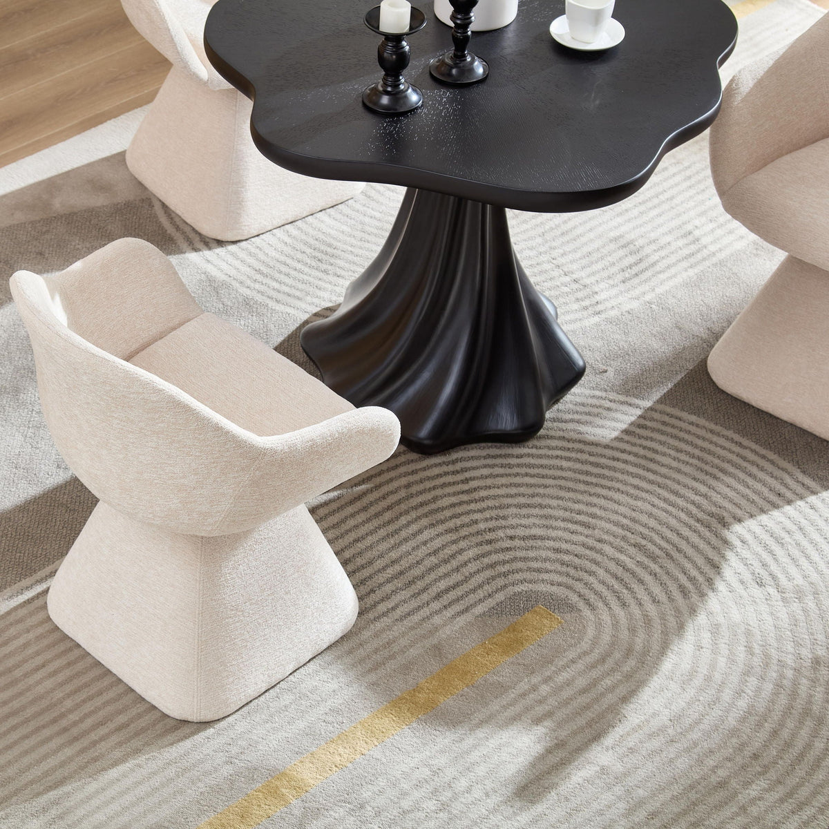 Beige velvet barrel-back swivel accent chairs, six around a glossy black pedestal table on Tampa Home & Garden Store