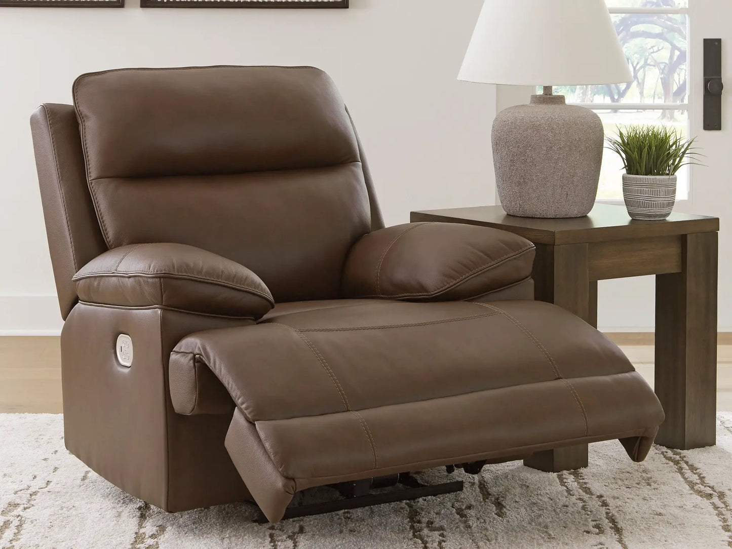 Power recliner with adjustable headrest in tobacco brown leather on Tampa Home & Garden Store