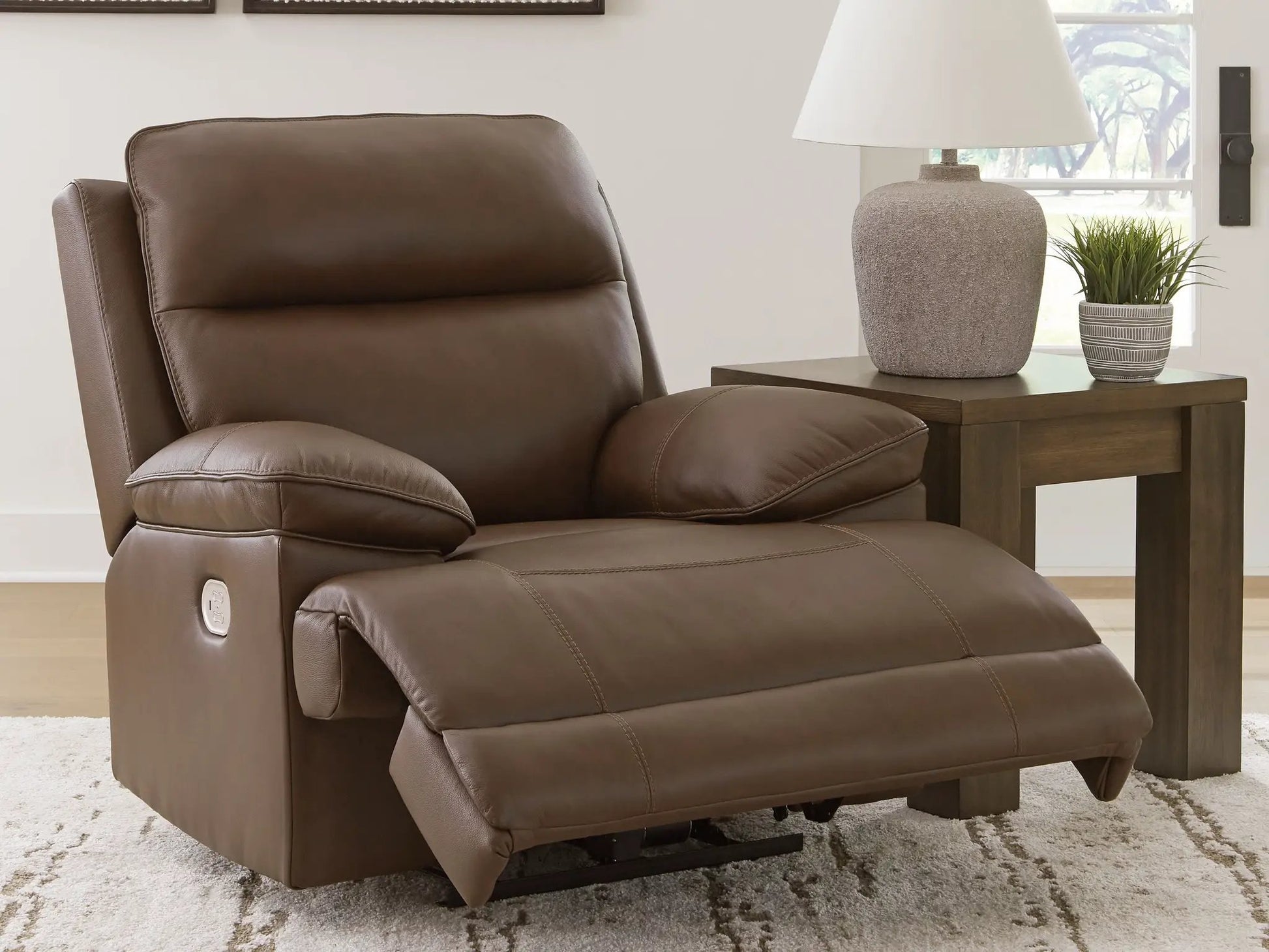 Power recliner with adjustable headrest in tobacco brown leather on Tampa Home & Garden Store