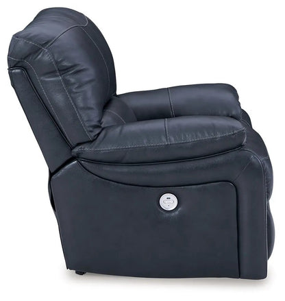 Leesworth rocker recliner in navy blue leather with power recline button on the outer side on Tampa Home & Garden Store