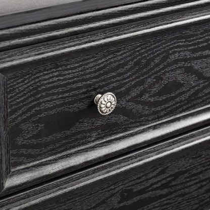 Modern 5-drawer black dresser with textured wood grain and silver rosette knobs on Tampa Home & Garden Store