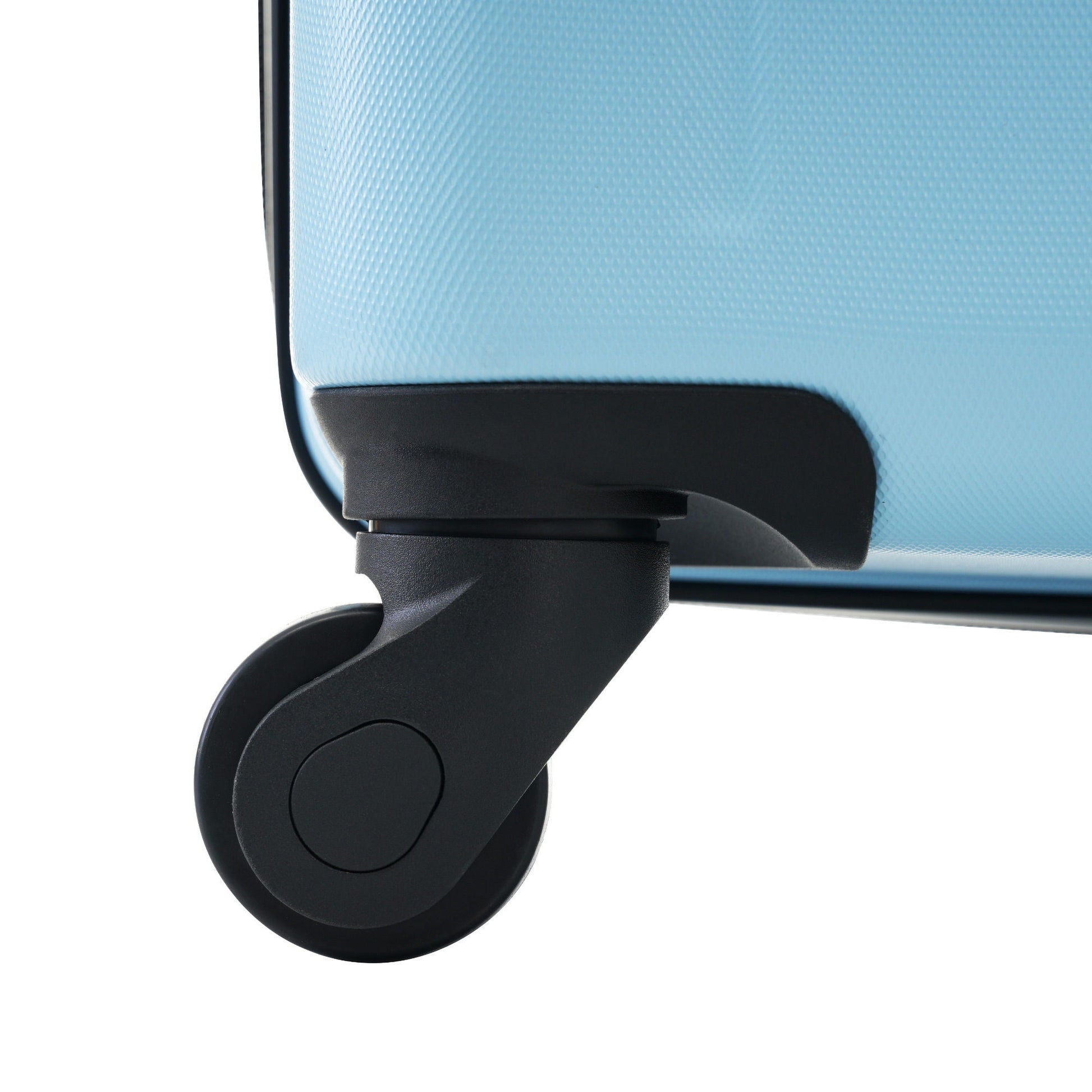 Luggage wheel close-up on blue ABS spinner suitcase with textured surface by HouseOfZazla on Tampa Home & Garden Store