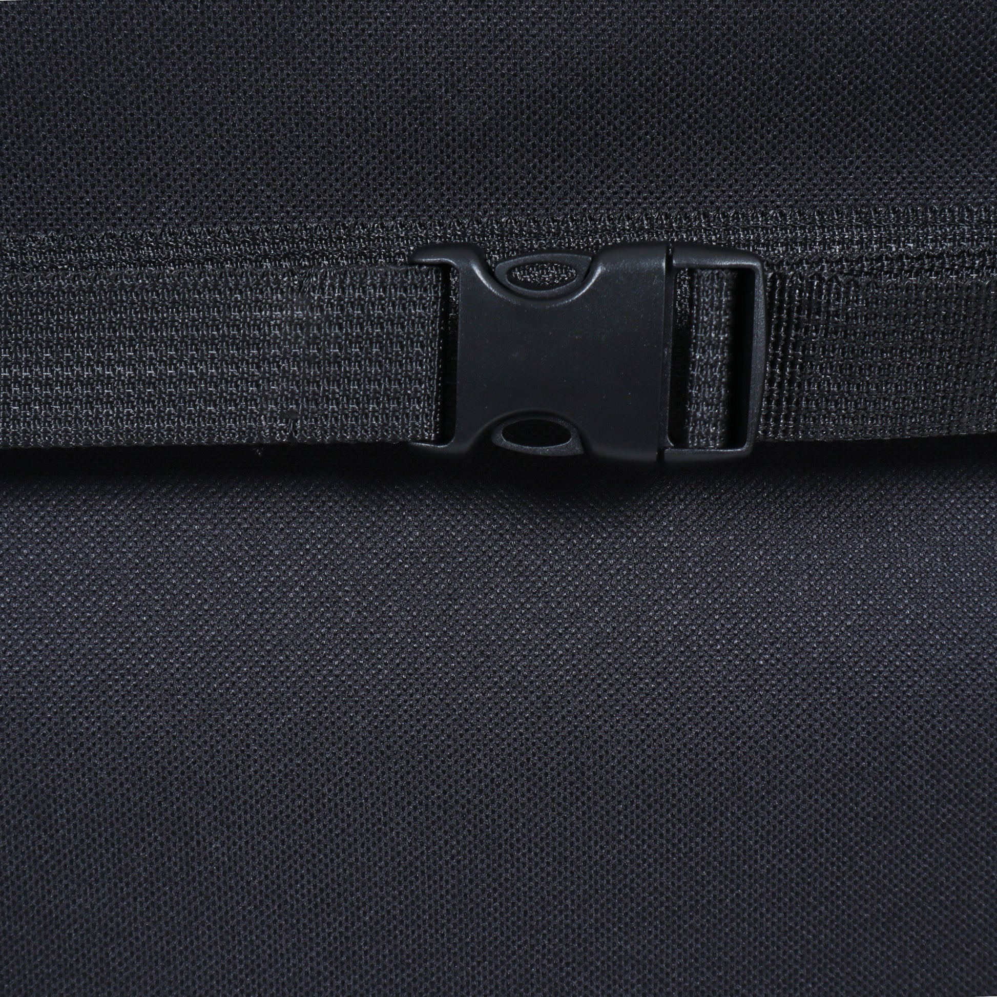 Pet trailer strap buckle on textured black fabric on Tampa Home & Garden Store