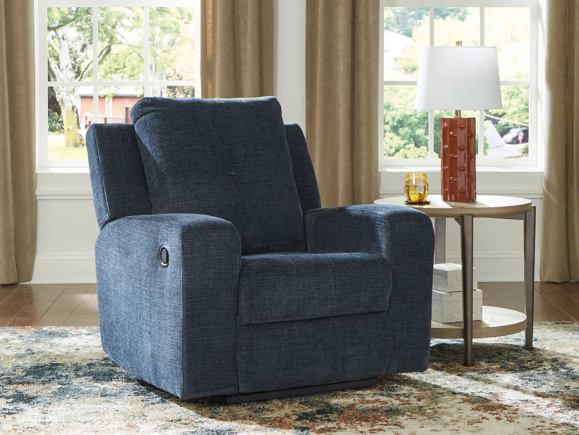 Danum - Zero Wall Recliner blue fabric recliner beside a round wood side table with lamp on Tampa Home & Garden Store