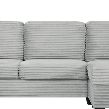 Upholstered sectional sofa cushions in light gray ribbed fabric with horizontal tufting on Tampa Home & Garden Store