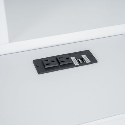 Black platform bed storage panel with USB ports and drawer slots on Tampa Home & Garden Store
