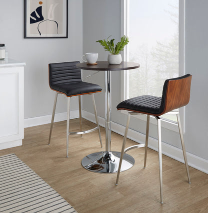 Bar table with clear acrylic top on chrome pedestal, with two black padded stools on Tampa Home & Garden Store