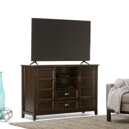 Handcrafted tall TV stand with storage in dark wood by HouseOfZazla, supports a flat-screen TV on Tampa Home & Garden Store