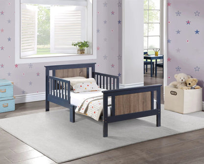 Connelly Reversible Panel Toddler Bed pair of navy frame beds with wood panel accents on Tampa Home & Garden Store
