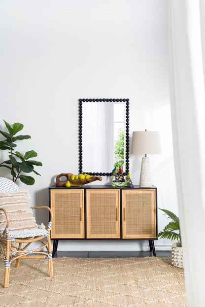 Rectangle black bead-framed wall mirror by HouseOfZazla on a woven cabinet in living room on Tampa Home & Garden Store