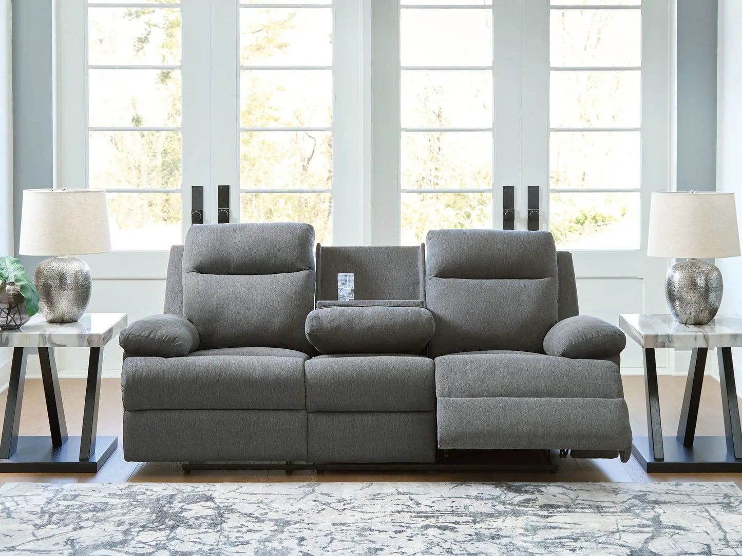 Side-Swipe reclining sofa with drop-down table in gray fabric upholstery on Tampa Home & Garden Store
