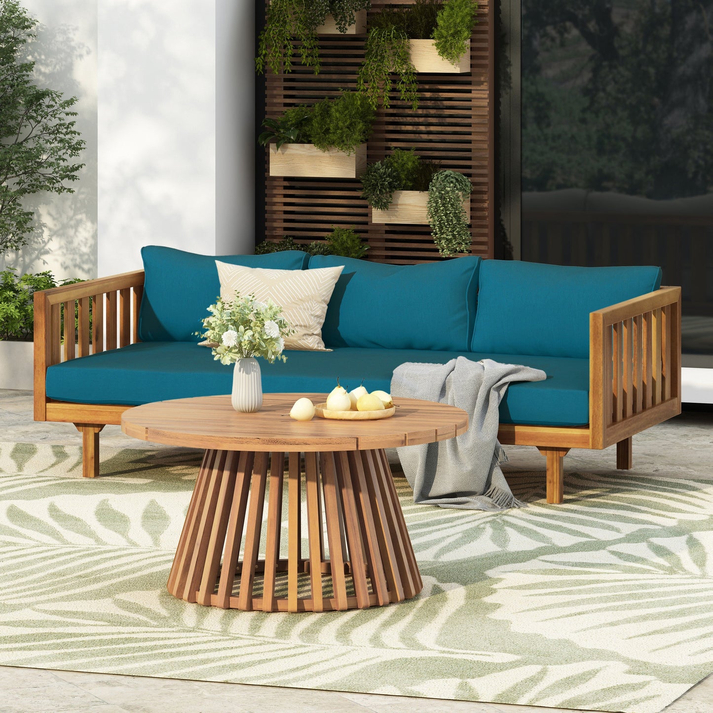 HouseOfZazla Claremont 3-seat patio daybed with teal cushions and round acacia table on Tampa Home & Garden Store