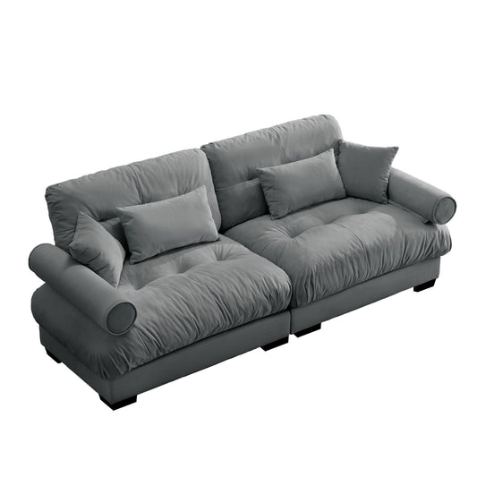 Modern oversize sofa with plush gray cushions and throw pillows on Tampa Home & Garden Store