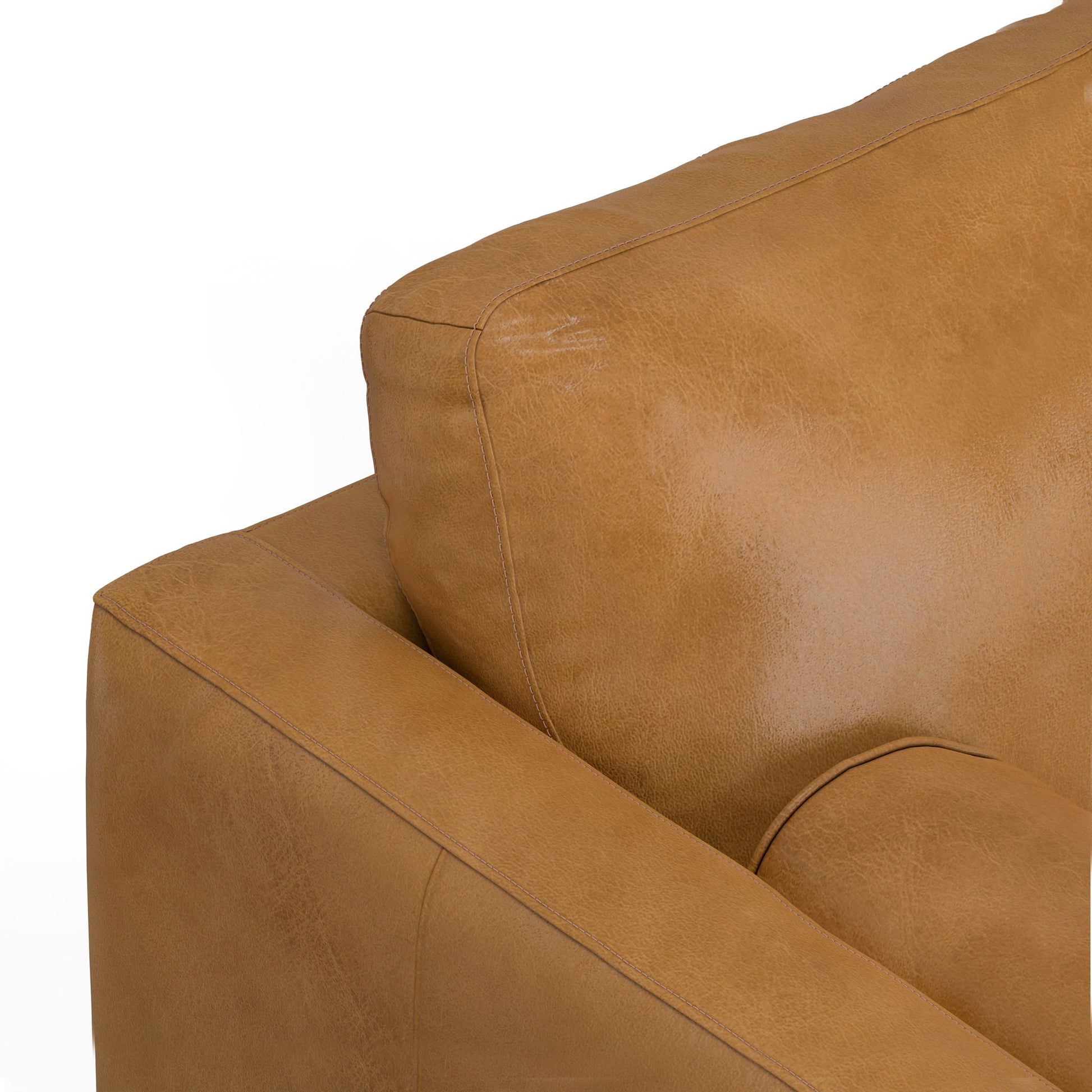 Morrison upholstered sectional sofa tan leather with visible topstitching and curved arm on Tampa Home & Garden Store
