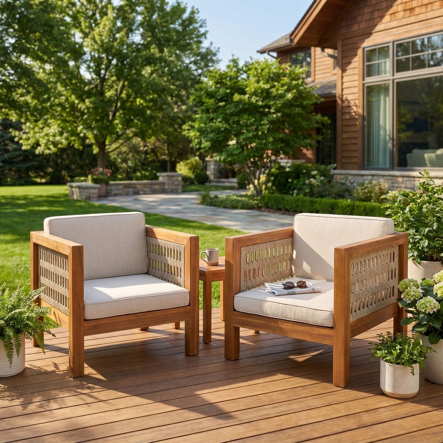 Pair of Outdoor Club Chairs with rope-arm design and beige cushions on a wooden deck on Tampa Home & Garden Store