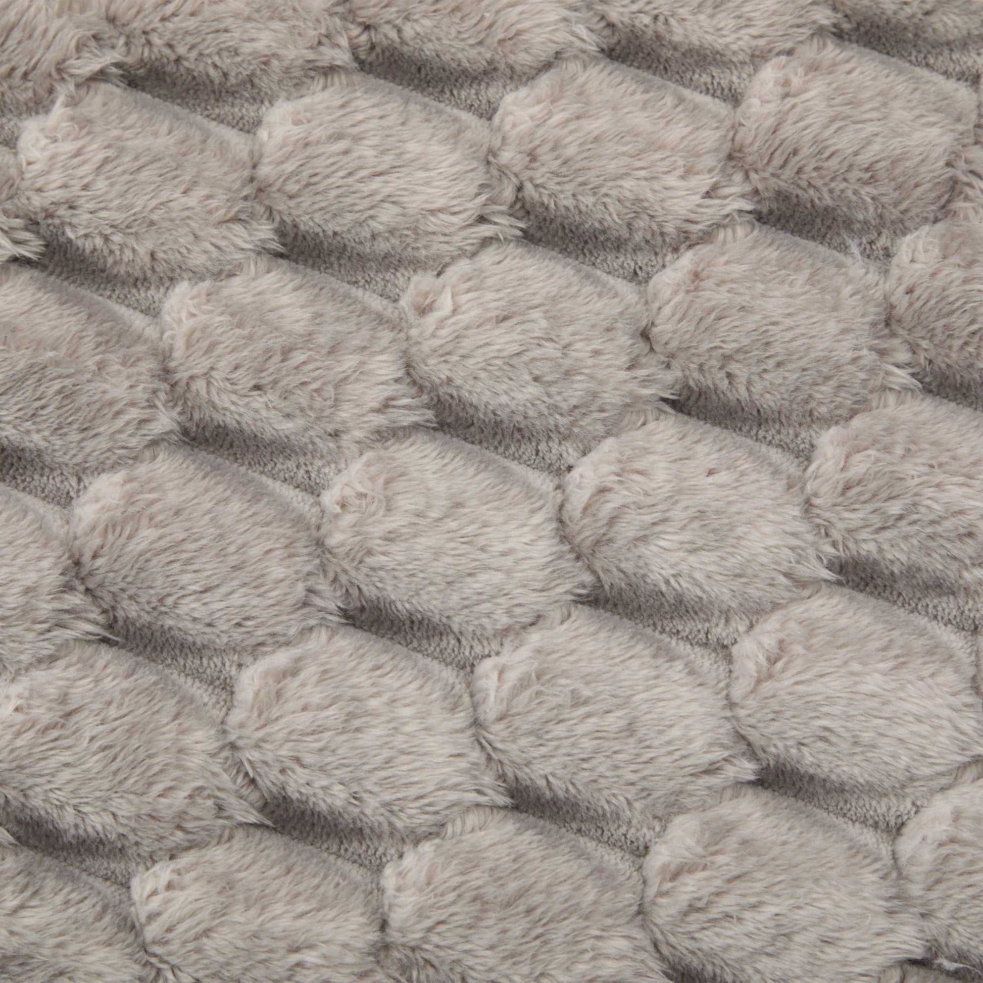 Modular sectional sofa beige plush faux fur upholstery close-up on Tampa Home & Garden Store