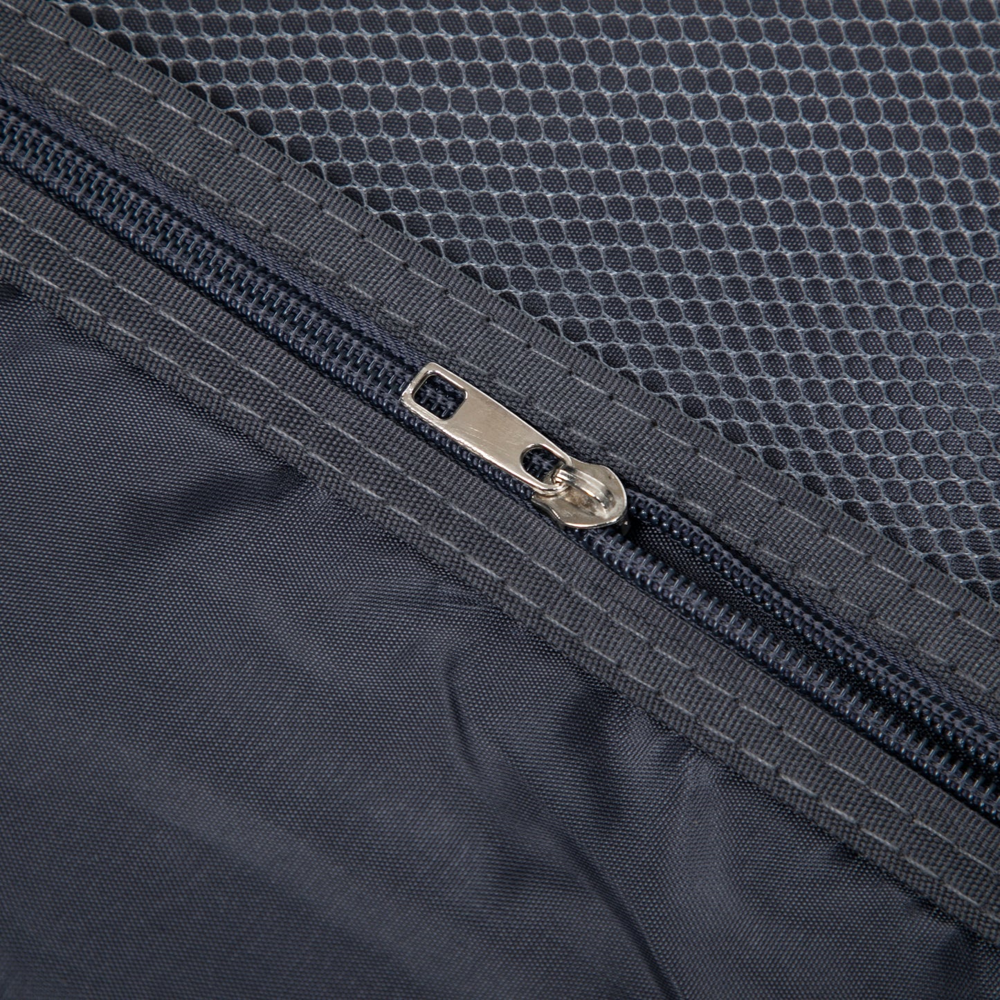 Luggage set zipper close-up on dark textured fabric from 14' & 20' ABS spinner wheel set on Tampa Home & Garden Store