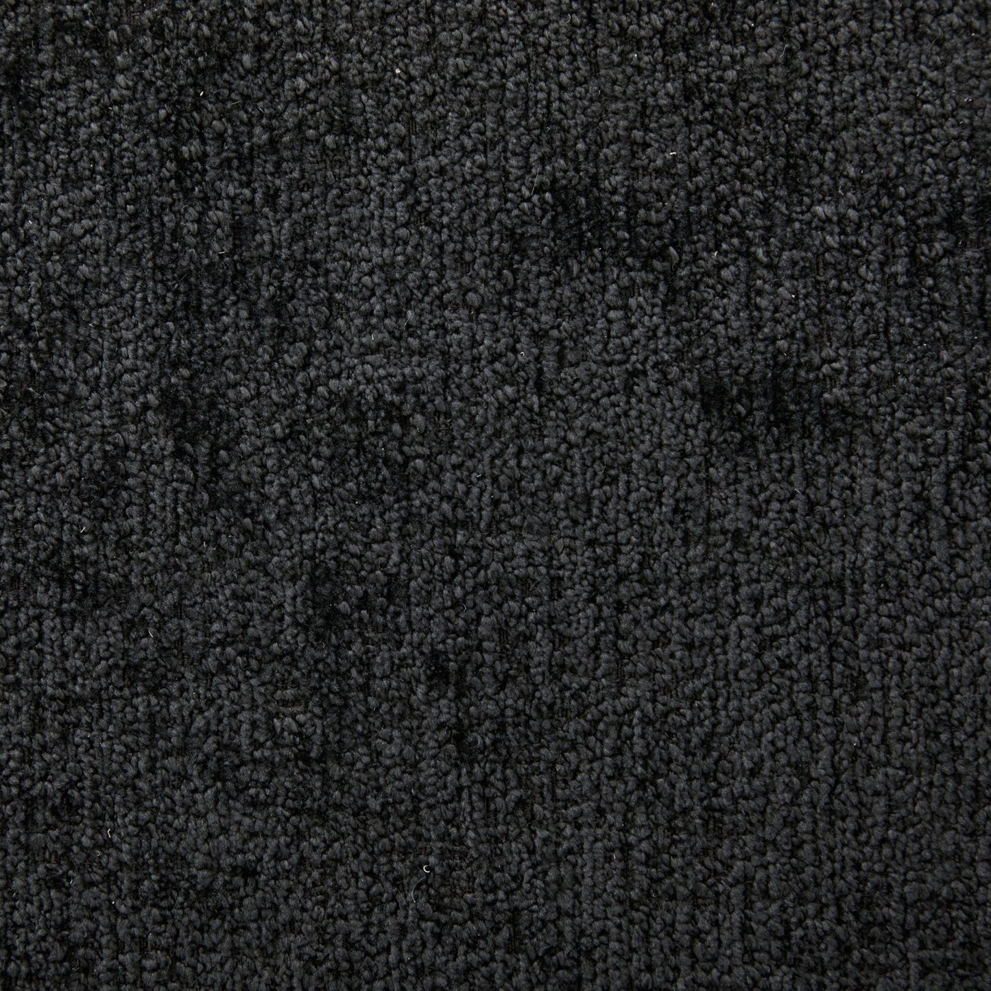 Black textured carpet closeup background on Tampa Home & Garden Store