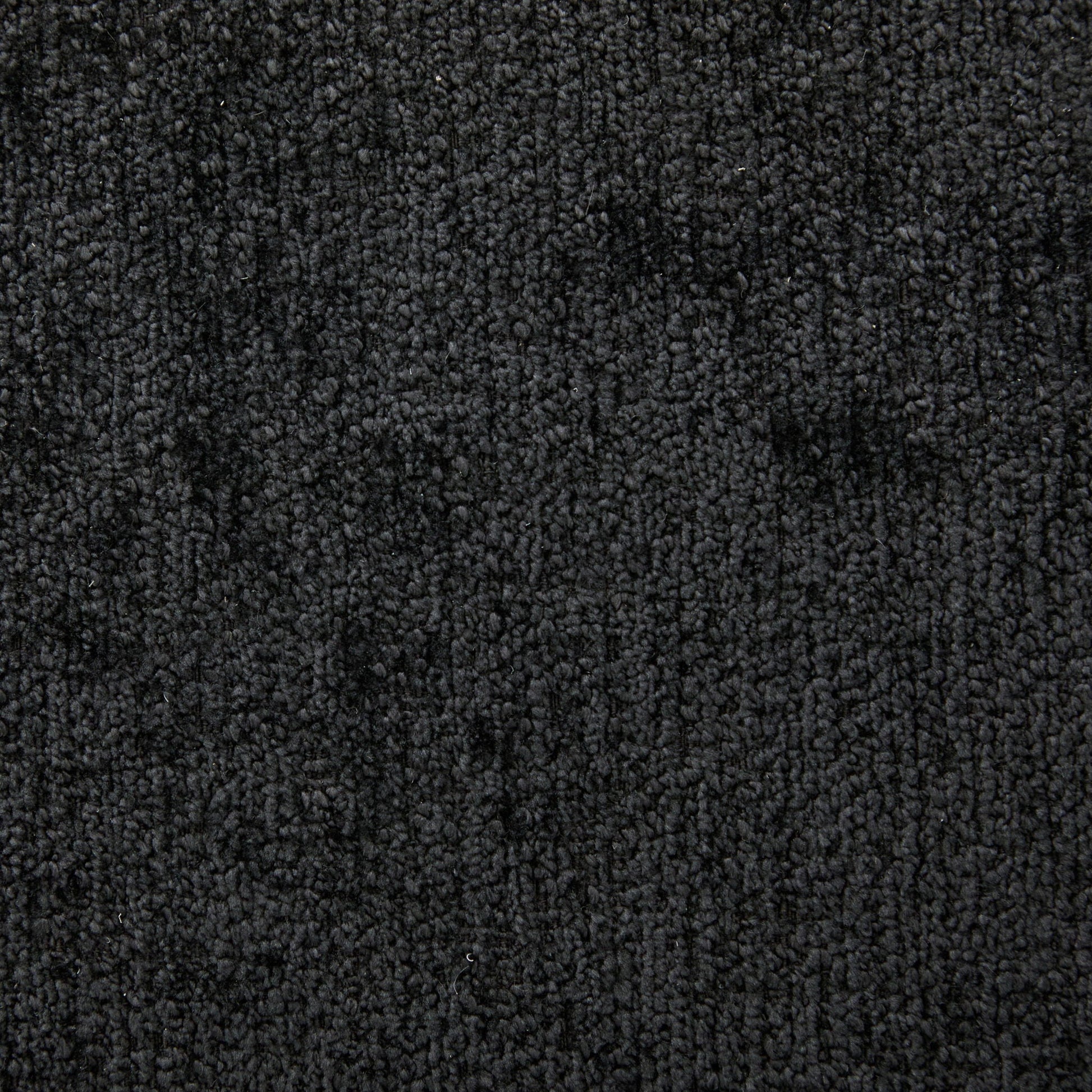 Black textured carpet closeup background on Tampa Home & Garden Store