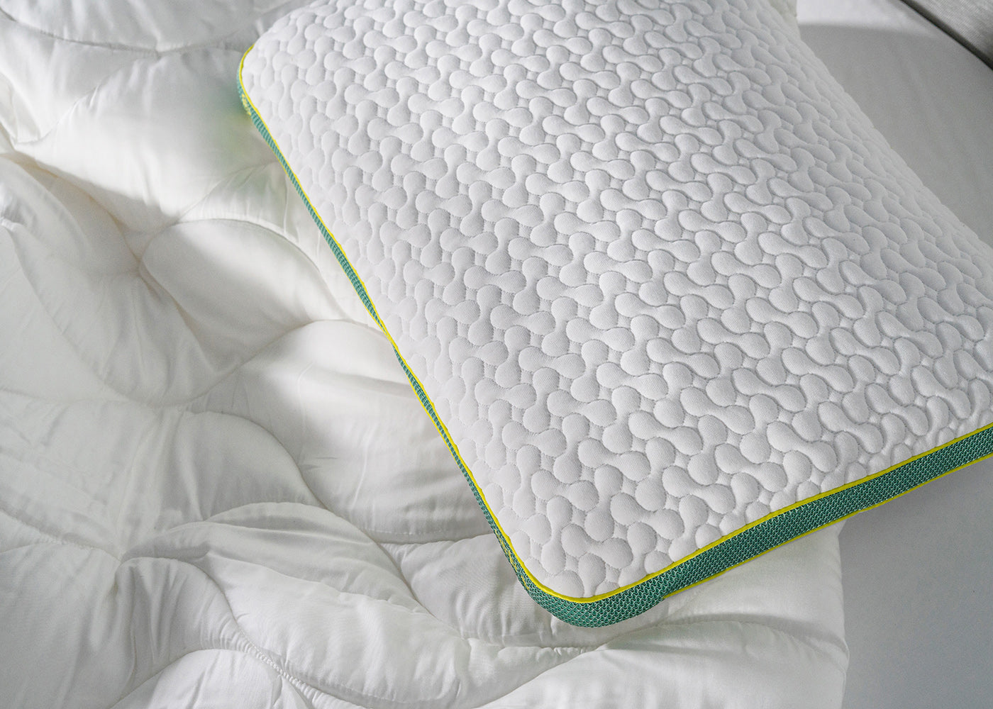 BedGear Astro Youth backrest pillow in white with quilted texture and neon green piping on Tampa Home & Garden Store