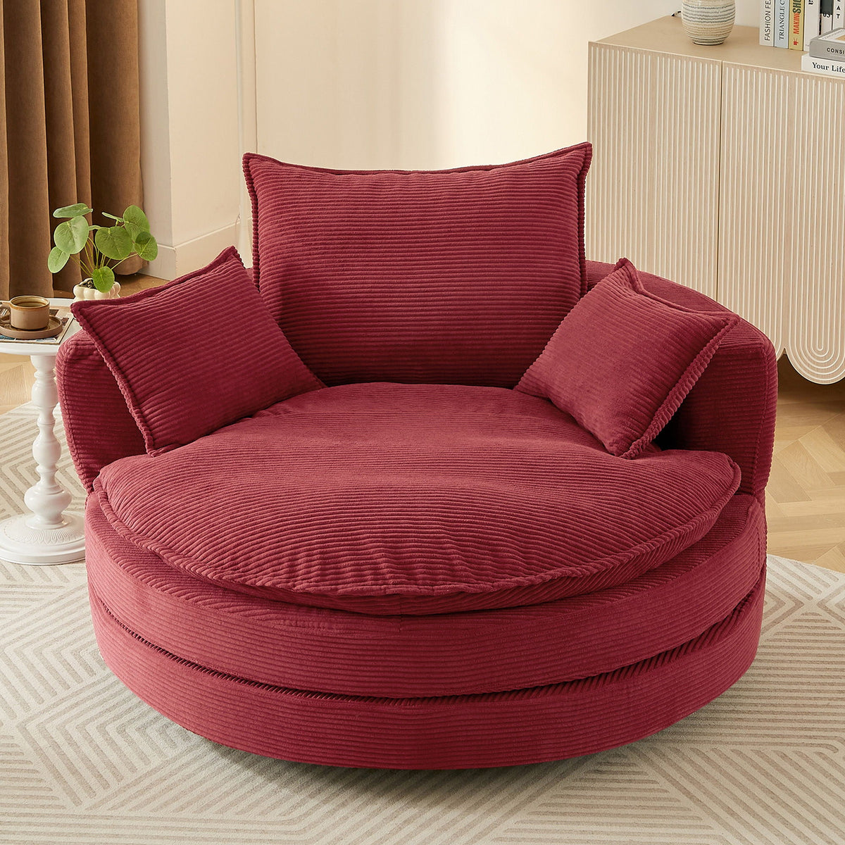 Swivel barrel chair in burgundy corduroy with cushions and pillows on Tampa Home & Garden Store
