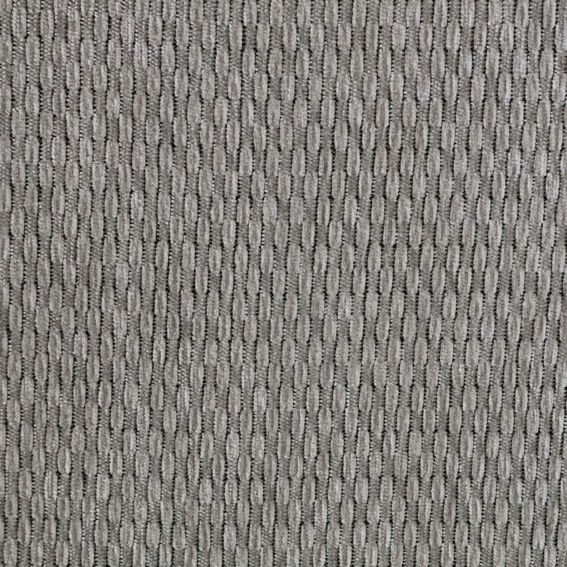 Gray textured carpet close-up with ribbed loop pattern on Tampa Home & Garden Store