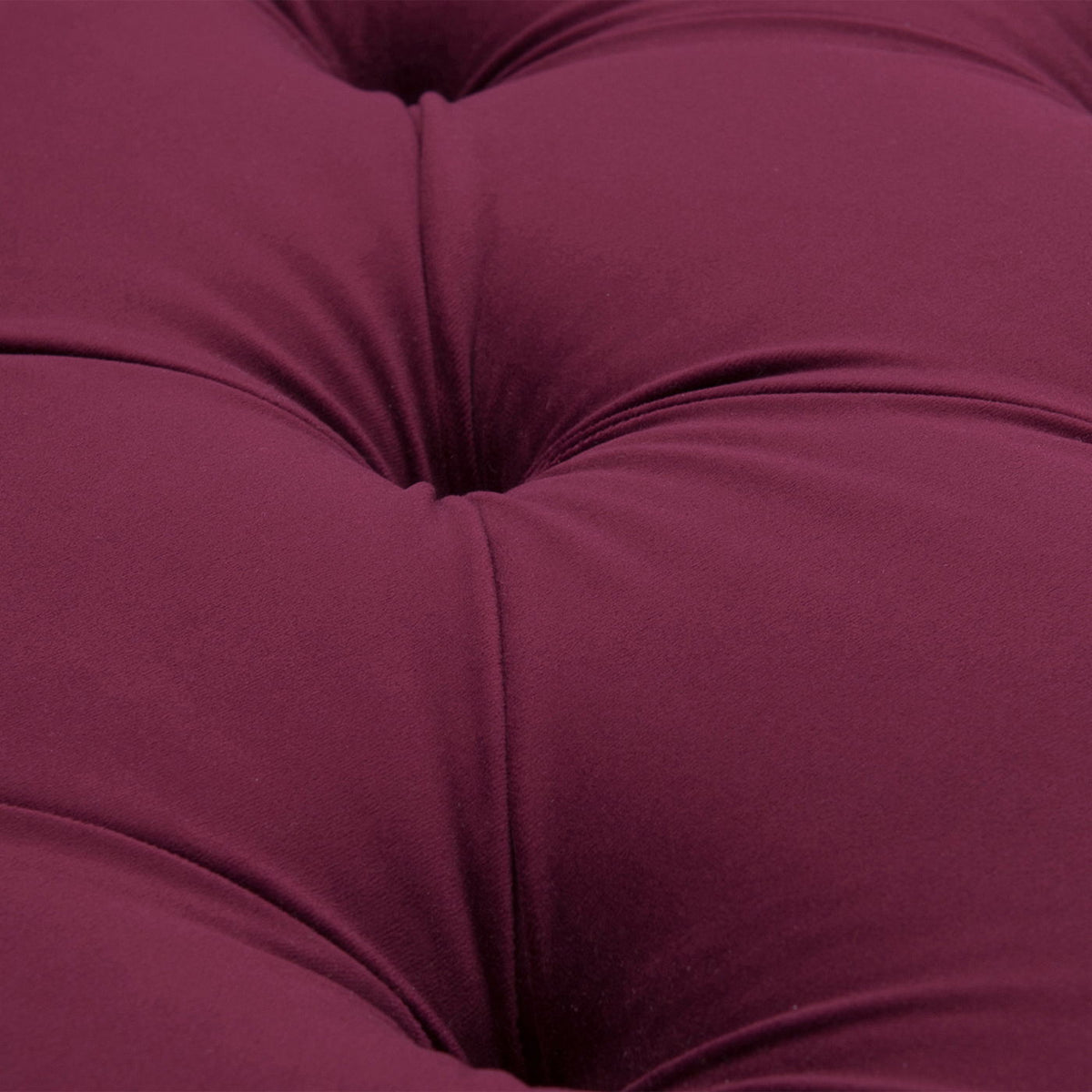 Tufted roll-arm chaise upholstery in burgundy fabric, close-up tufting texture on Tampa Home & Garden Store